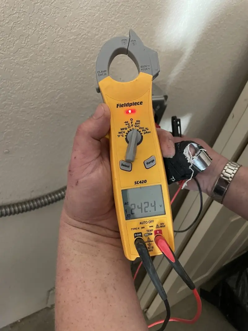 Voltage testing with clamp meter during Aluminum Wiring Replacement in Spencerport
